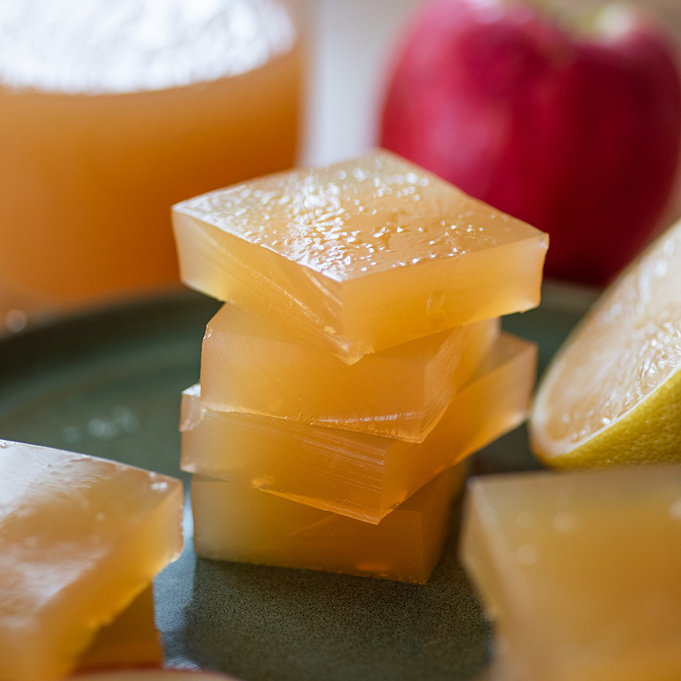 Stack of four apple cider gelatin gummy squares